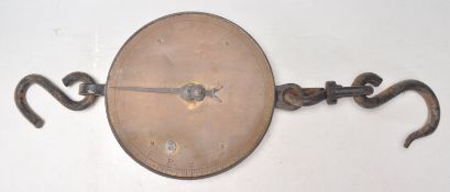 A 19th Century Victorian butchers hanging scales having a round dial up to 100lb's with hook