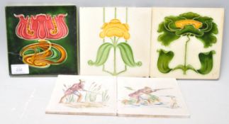 A group of three 19th Century Victorian Art Nouveau coloured wall tiles together with two Pilkington