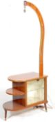 A vintage mid 20th Century 1950's cocktail cabinet and lamp combination having a glazed cabinet with