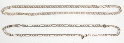 Two silver flat link necklace chains, one being a Figaro example with both having a lobster clasp.