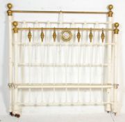 A 19th Century Victorian brass double bed frame having ball finials on tubular supports, each