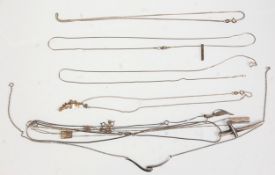 A good selection of silver necklace chains and pendants to include snake and box link chains, flat