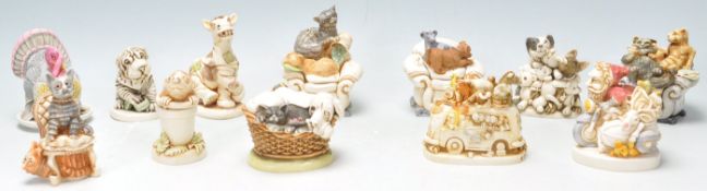 A group of twelve Harmony kingdom novelty resin figurine / boxes to include a Sharpei dog, a Turkey,