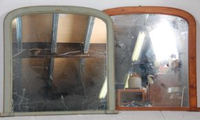 Two vintage 20th Century dome topped over mantle wall mirrors both being wooden framed, one having