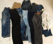 A good collection of gentlemen's designer jeans to include designers Paul Smith, Calvin Klein, Levi,