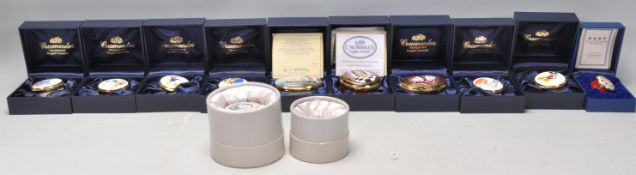 A collection of Crummles hand painted enamelled boxes to include a selection of Disney boxes, an