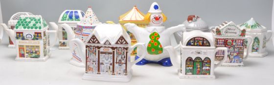 A mixed collection of ceramic collectors teapots of various forms and makes to include many in the