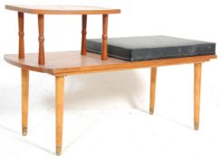 A vintage retro 1970's telephone seat having a teak wood seat with turned legs having a leather