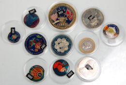 A good group of eleven coins being hand enamelled to the reverse sides to include £1 Falkland