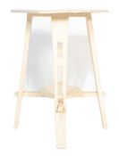 A 19th Century Victorian painted mahogany arts and crafts occasional table having pierced legs