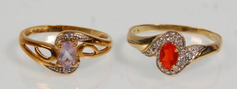 Two 9ct yellow gold ladies dress rings. One set with a central orange oval faceted cut stone with