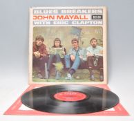 A vinyl long play LP record album by John Mayall And The Bluesbreakers – With Eric Clapton  –