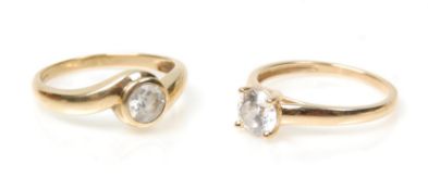 Two 9ct gold ladies rings to include a crossover ring set with a white stone (hallmarked Birmingham,