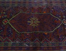 A stunning vintage 20th Century Persian / Islamic floor rug having blue ground with geometric