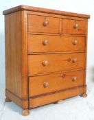 A 19th Century Victorian pine chest of drawers having two drawers over three with turned knob
