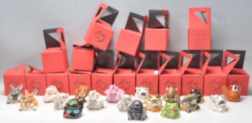 A group of eighteen Kevin Francis face pots in the form of various animals to include tiger,