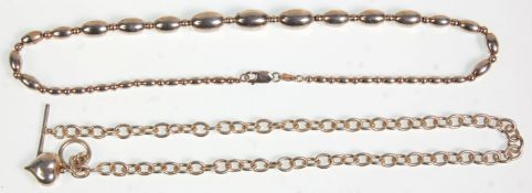 Two silver ladies necklaces to include one having graduating beads with a lobster clasp and the