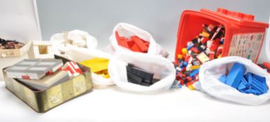 A mix lot of vintage Lego bricks and accessories.