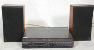 A Bang and Olufsen 1800 Beogram hifi vinyl turntable / record player, chrome body with smokey