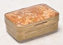 A 19th Century antique rectangular pill / snuff box being brass bound set with rectangular agate