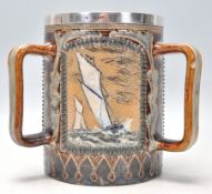 Edgar Wilson - A 19th Century Victorian rare Doulton Lambeth stoneware tyg / three handled cup