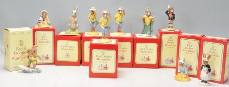 A group of nine Royal Doulton ceramic Bunnykins figures to include Seaside DB177, Nurse DB74, Aussie