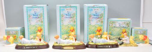 A group of six Royal Doulton ceramic figures from 'The Winnie The Pooh Collection' to include