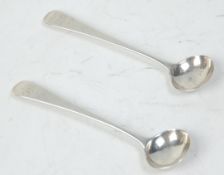 A lovely pair of early 19th Century George III condiment Spoons having monogrammed handles for 'T.