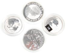 A group of four fine silver coins to include 1oz 2016 2 pound coin for the Year of the Monkey,