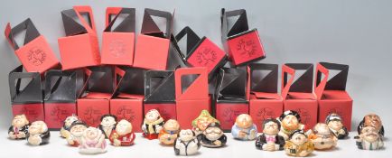 A collection of twenty ceramic Kevin Francis face pots to include Charlie Chaplin, Albert