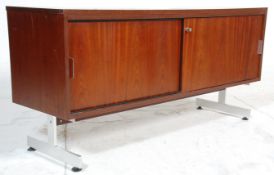 A  mid century Italian sideboard credenza in the manner of Florence Knoll. Raised on chrome supports