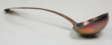A 19th Century Georgian silver hallmarked large ladle having a monogramed handle. Hallmarked for