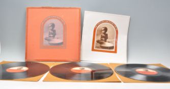 A three vinyl long play LP record album box set by George Harrison – The Concert For Bangladesh –
