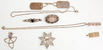 A mixed group of silver jewellery to include a floral brooch set with a pink stone cabochon,