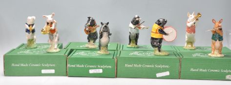 A group eight Beswick ceramic animal musicians / music band to include Andrew, Richard, Christopher,