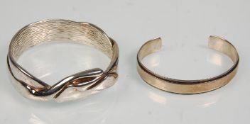 A good heavy 925 silver hallmarked bangle of plain banded form bearing English import marks.