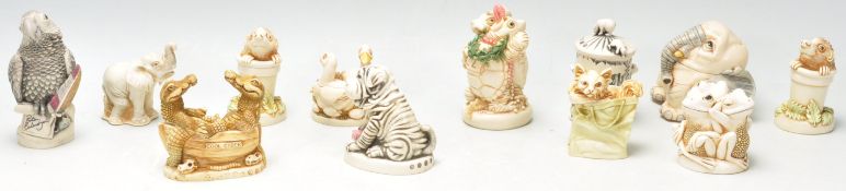 A group of twelve Harmony Kingdom resin animal novelty figurines to include Elephants, two