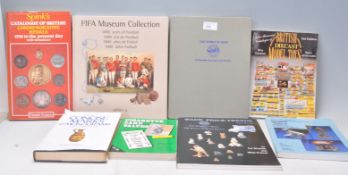 A group of eight assorted antiques and collectables related books; the World of Wade Collectable