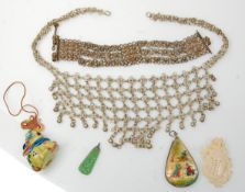 A collection of Middle eastern and Oriental jewellery to include silver white metal collar chain
