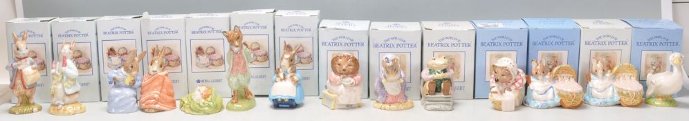 A good group of fourteen mostly Royal Albert (3x Beswick) ceramic figures in 'The World Of Beatrix