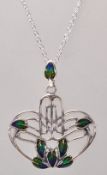 A stamped sterling silver pendant necklace having a Art Nouveau knot design pendant with enamelled