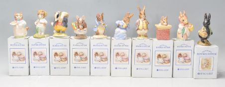 A group of nine Royal Albert 'The World Of Beatrix Potter' ceramic figures to include Mrs Ribby,