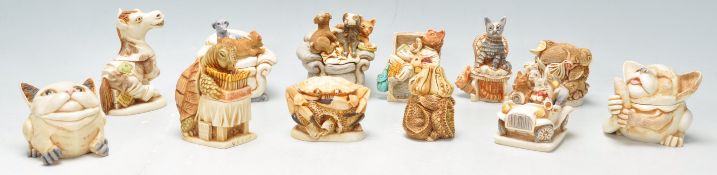 A group of twelve Harmony Kingdom resin animal novelty figurines / trinket pots to include Sheba's