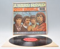 A vinyl long play LP record album by John Mayall And The Bluesbreakers – A Hard Road – Original