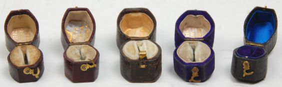 A good group of six antique ring boxes to include mostly leather examples with one red having gilt