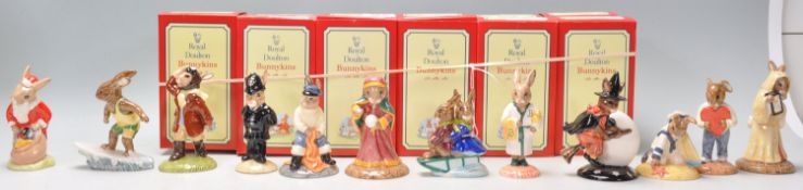 A group of twelve Royal Doulton Bunnykins ceramic figures to include an unusual Santa Bunnykins 