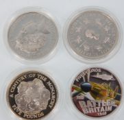 A group of four silver £5 coins to include The Queen Mother's Centenary 2000 coin, A Century of