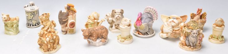A group of thirteen Harmony Kingdom resin animal novelty figurines / trinket pots to include '