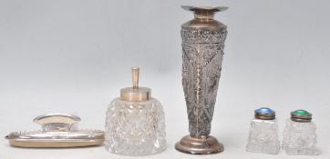 A group of antique silver to include a pair of cut glass cruets with blue and green enamelled silver