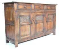 A good quality 20th century Ipswitch oak dresser base sideboard having three drawers with knob